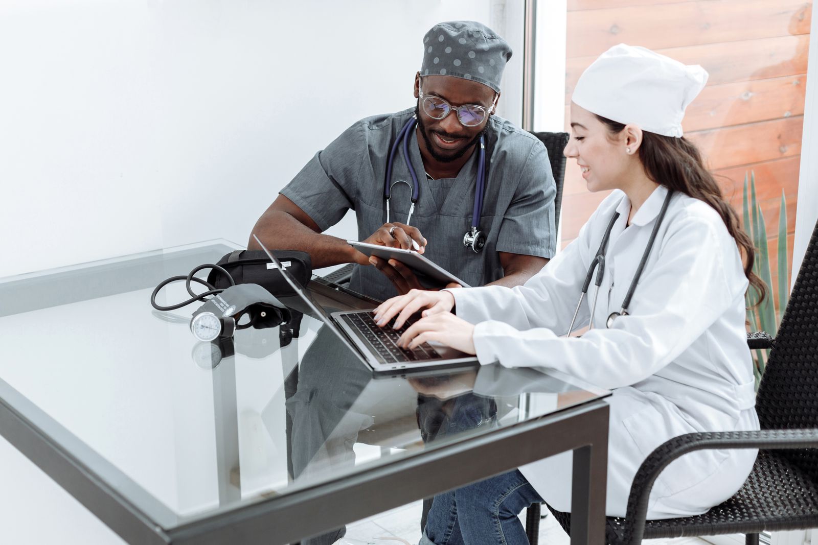 A medical team in a professional discussion around a table